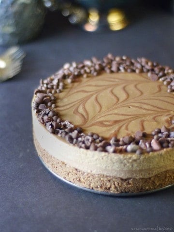 a raw vegan cheesecake with layers of chocolate espresso and salted caramel